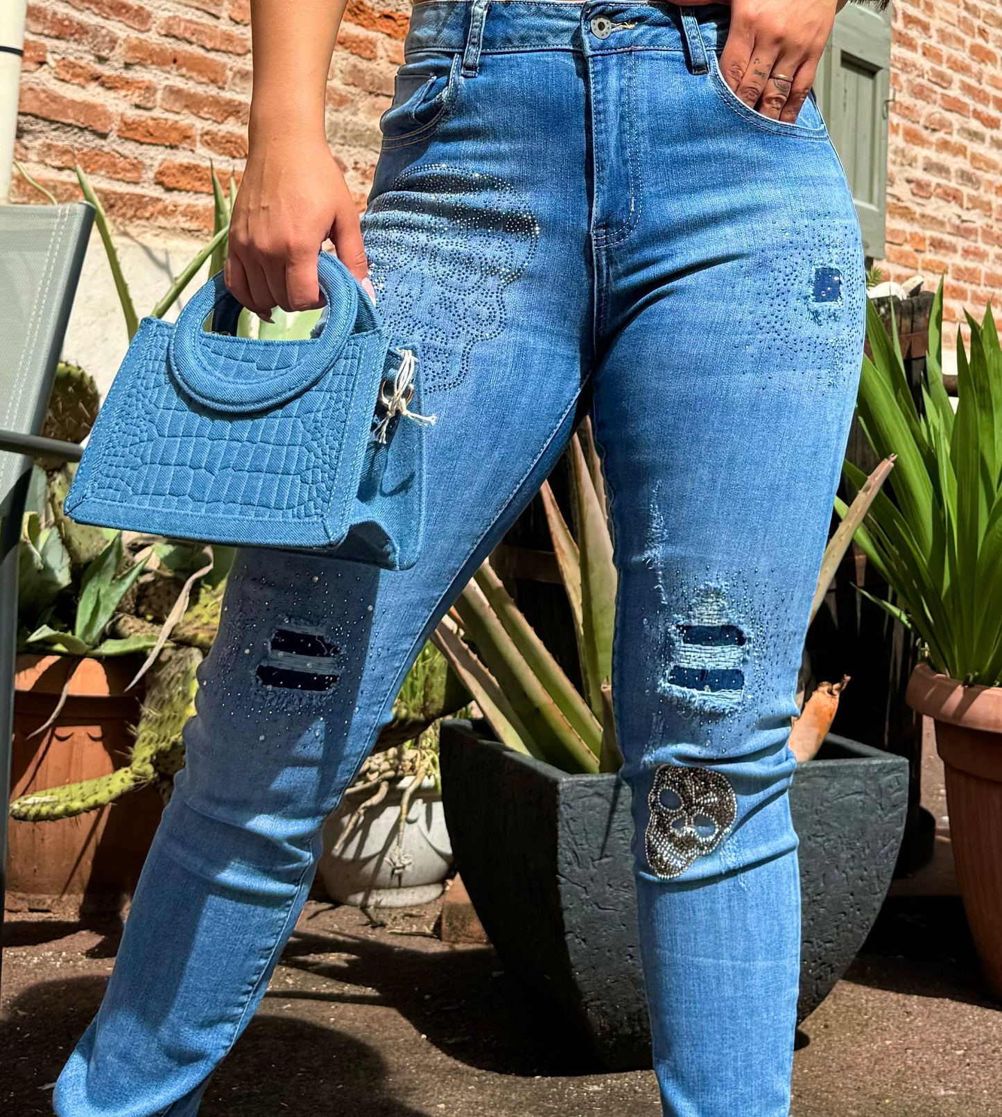 Jeans strass crâne